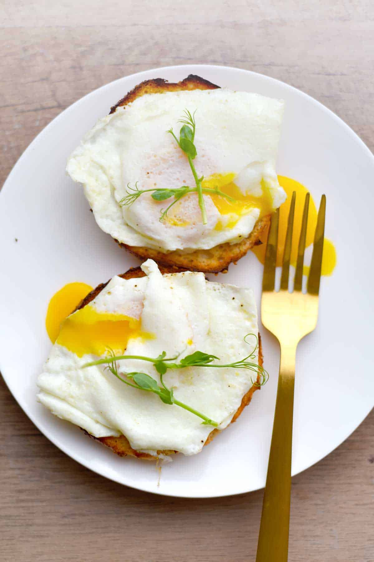 Baked Bagels topped with poached eggs
