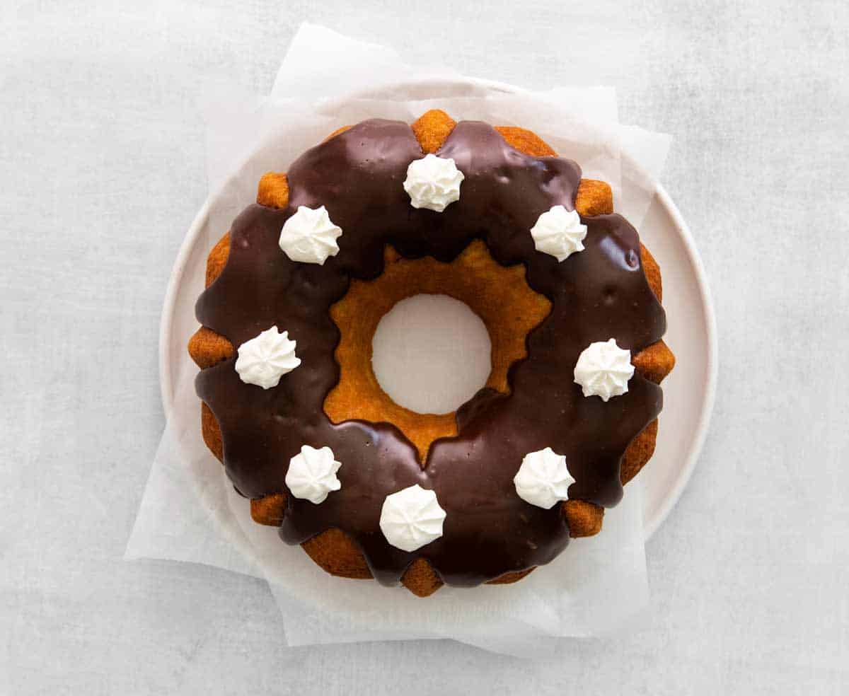 https://www.mightymrs.com/wp-content/uploads/boston-cream-bundt-cake-whipped-cream.jpg