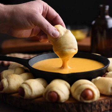 Beer Cheese Dip with Pigs in a Blanket made with Cheddarbest Sausage