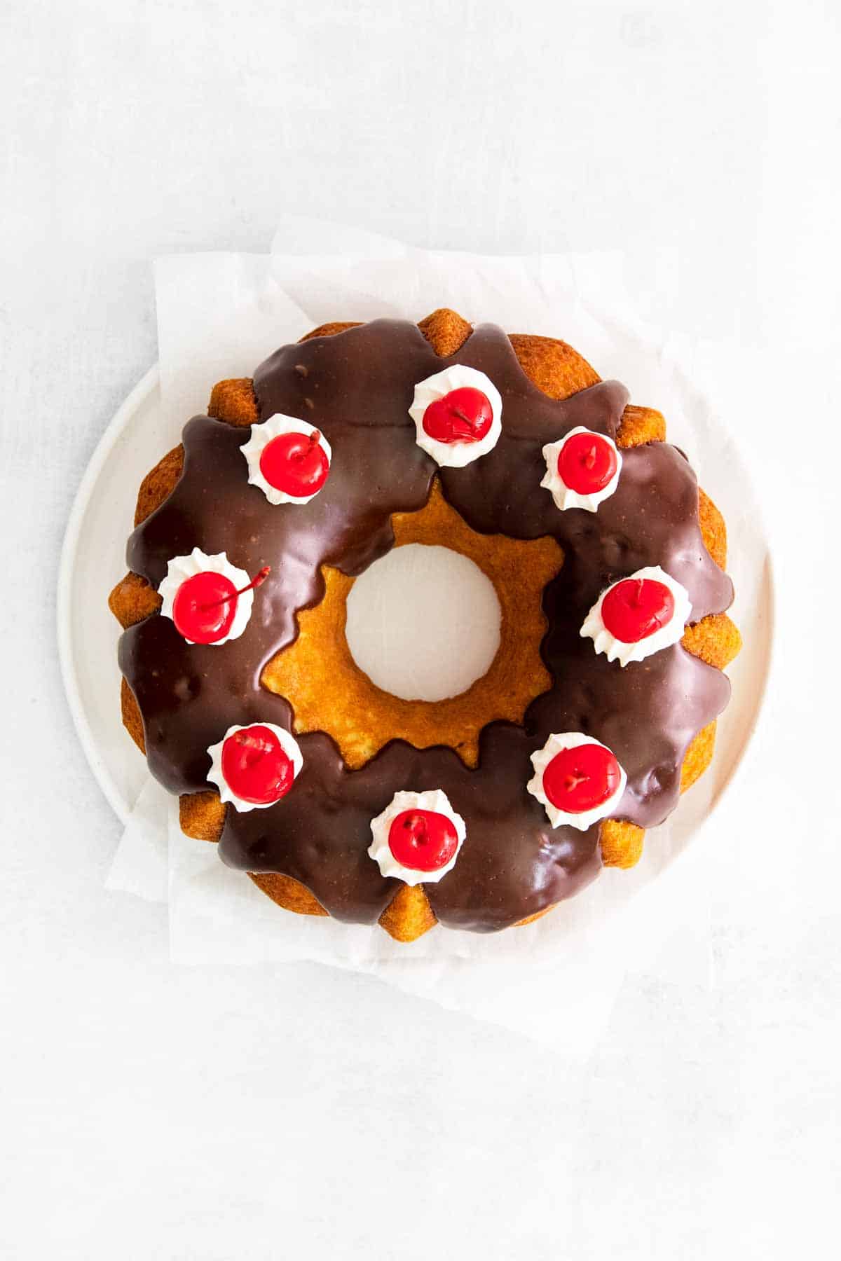 Boston Cream Bundt Cake - Topped with Cherries