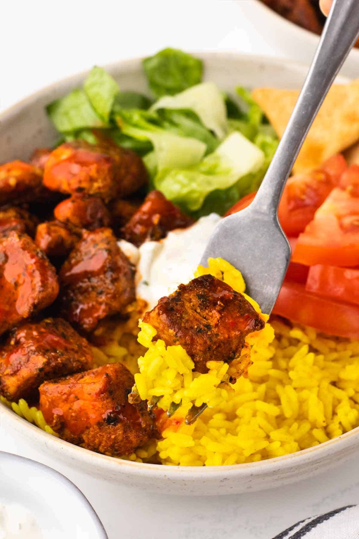 Chicken Shawarma Rice Bowl with Harissa and Tzatziki Sauce