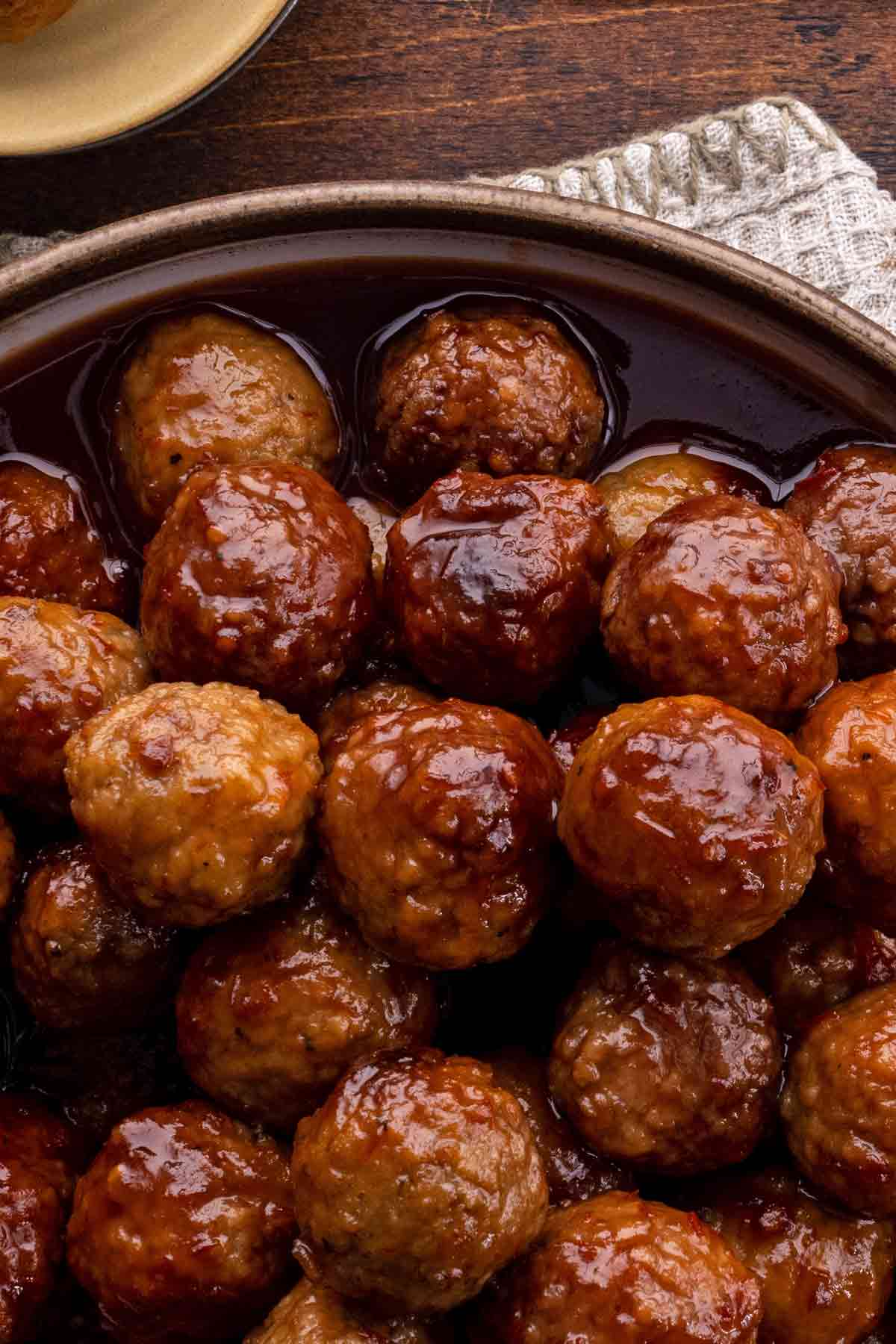 Slow Cooker Grape Jelly Meatballs - The Magical Slow Cooker