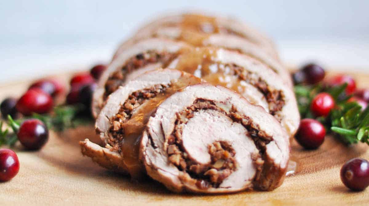 Holiday Stuffed Pork Loin with Cranberries, Walnuts, Bacon and Gravy