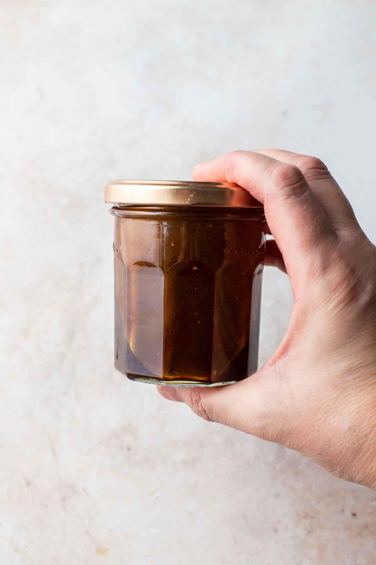 Shaking to Combine Homemade Balsamic Dressing