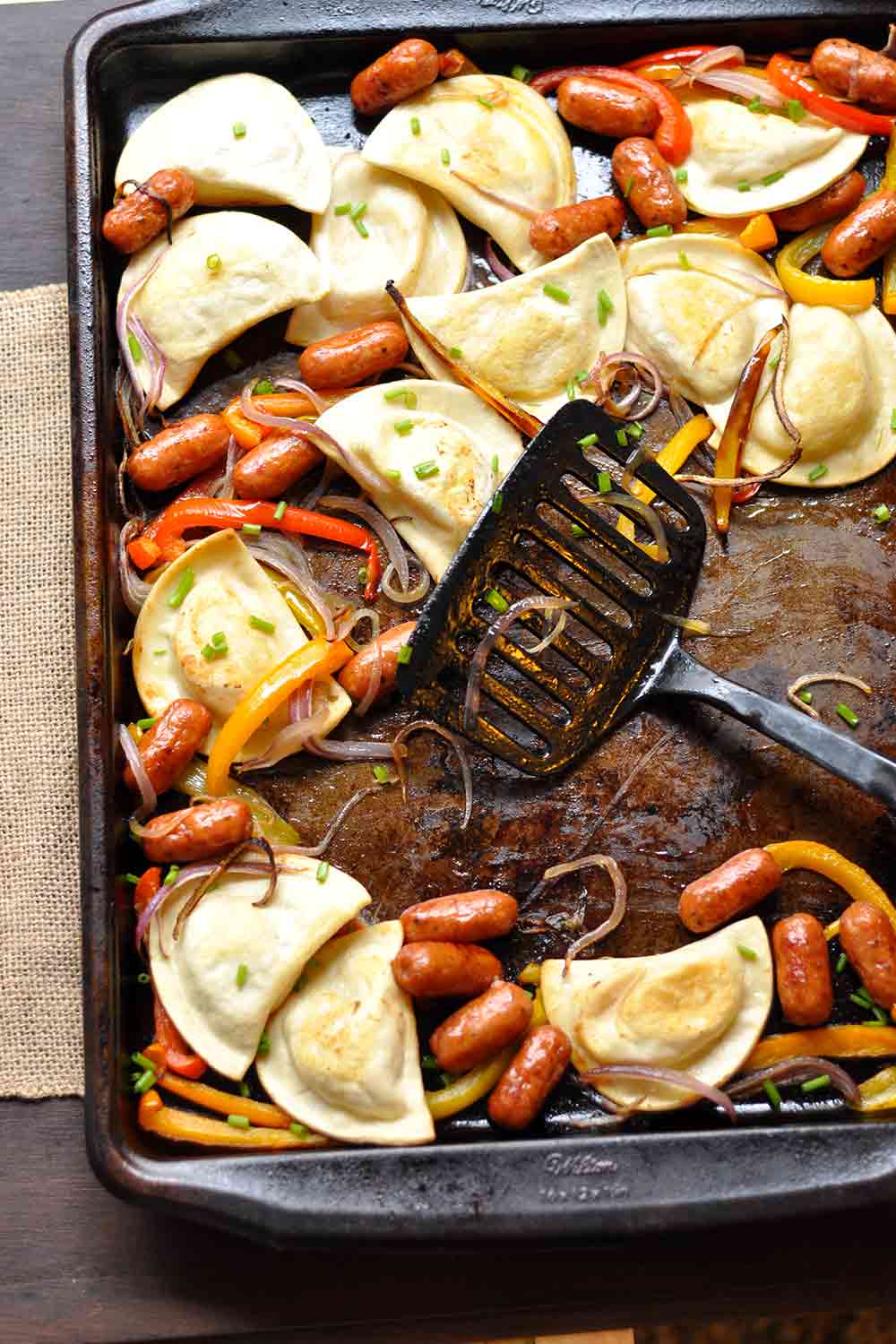Pierogies and Kielbasa with Peppers and Onions Cook on Sheet Pan