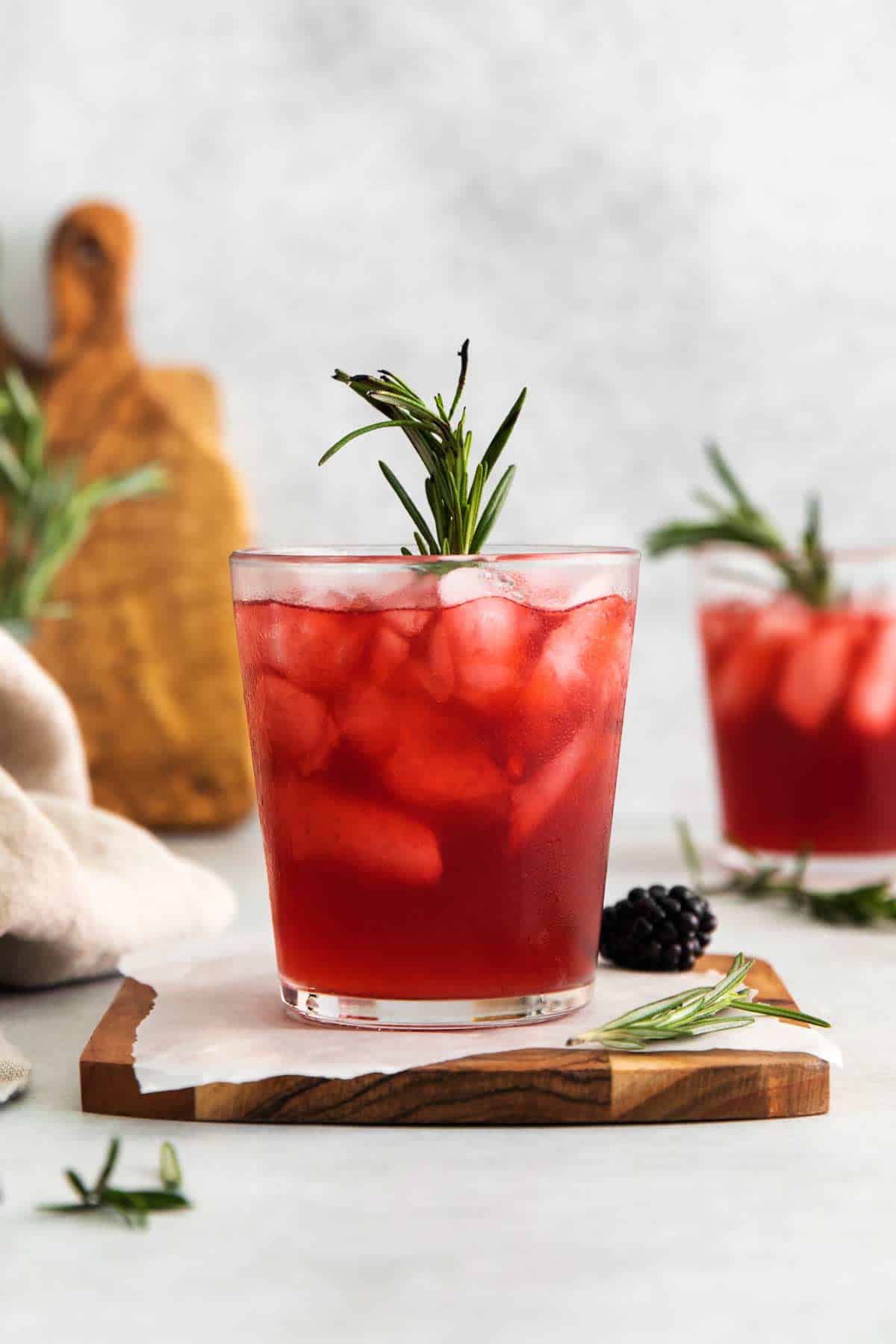 Blackberry Whiskey Sour Cocktail with Smoked Rosemary Garnish