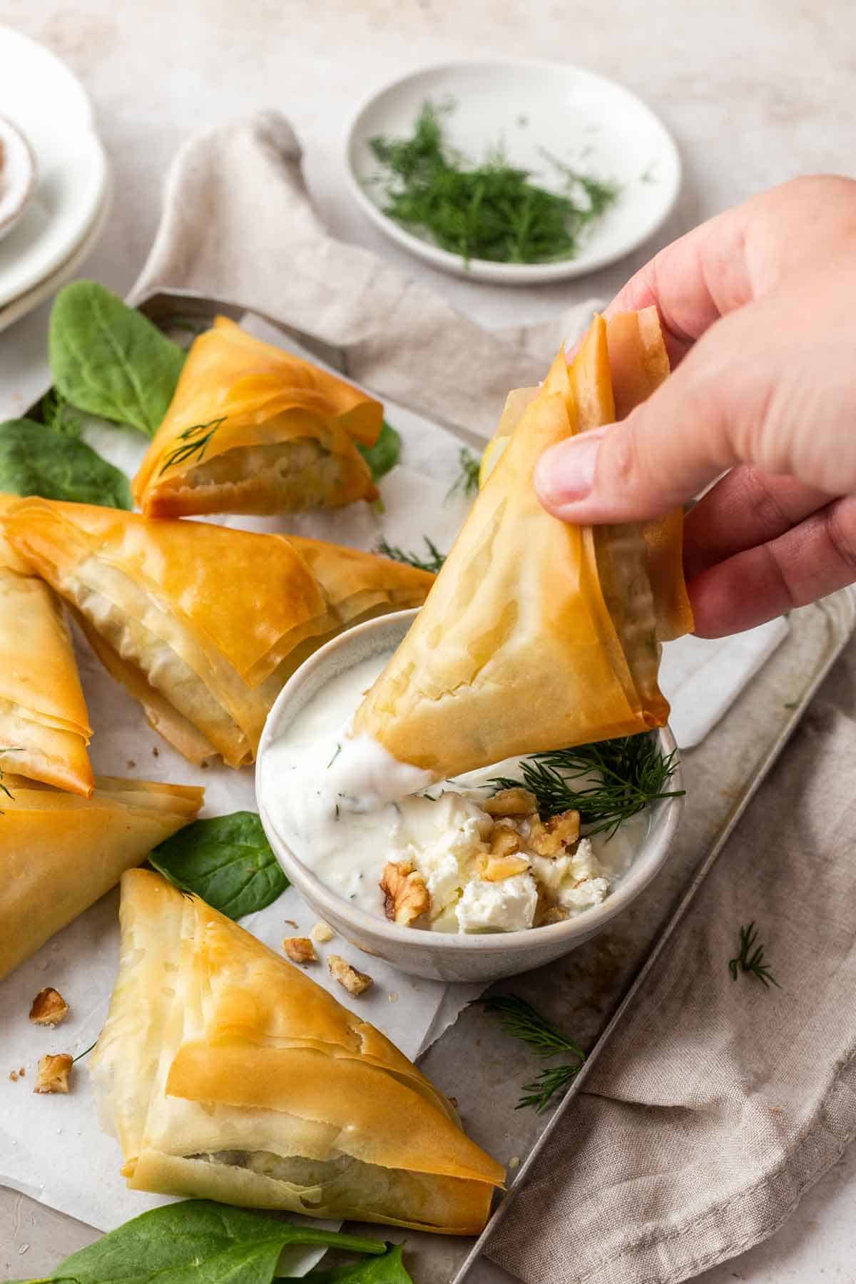 Spinach Feta Triangles (Spanakopita) with Tzatziki Sauce