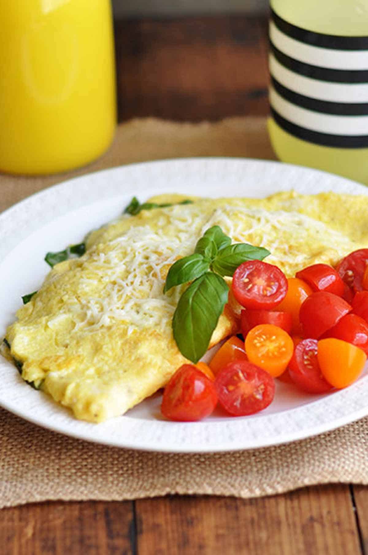 Spinach Omelette with Basil and Mozzarella Cheese and Tomatoes