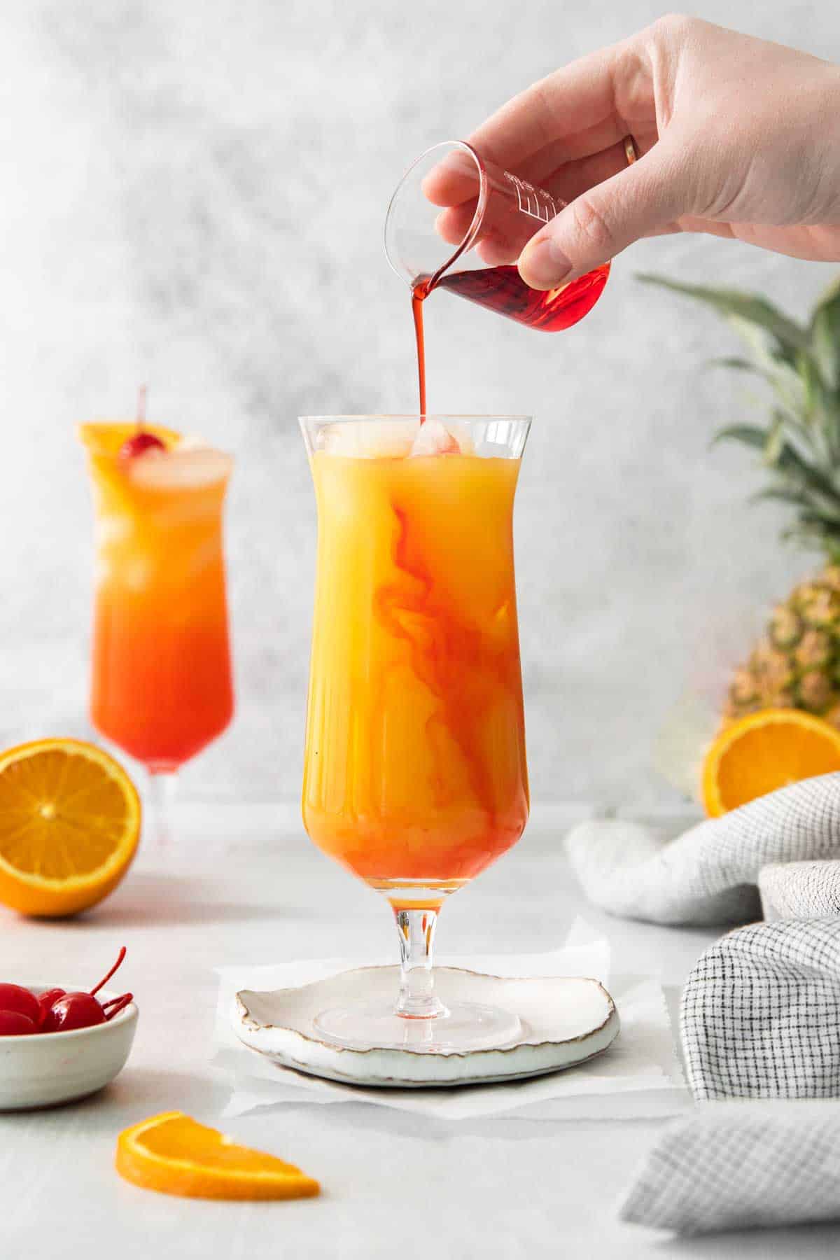 Tropical Tequila Sunrise with grenadine pour