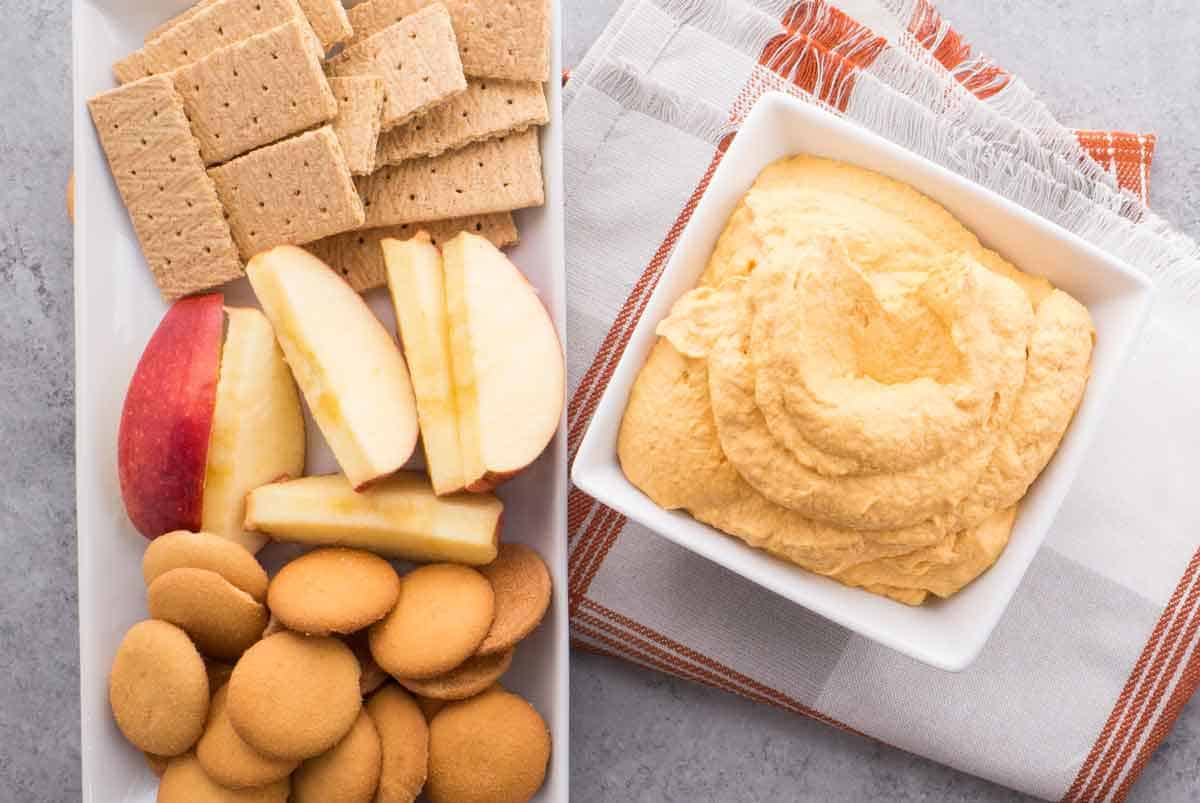 Whipped Pumpkin Dip with apples, graham crackers and Nilla waffer. 