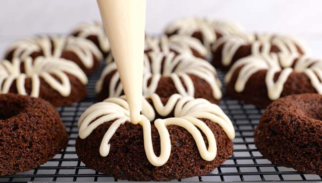 White Chocolate Maple Icing Piped onto Donut